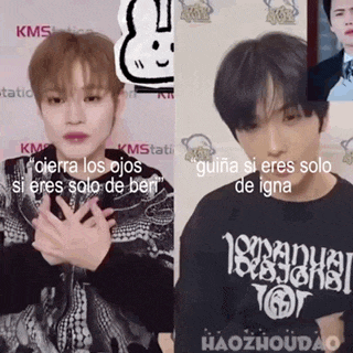 a man wearing a black shirt that says iguana si eres solo de igna on it