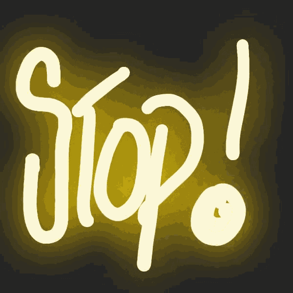 the word stop is written in white on a yellow background