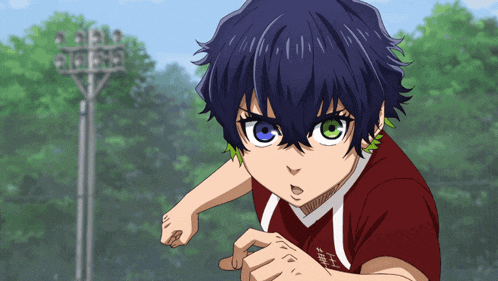 a young boy with blue hair and green eyes is wearing a red and white jersey with the letter m on it