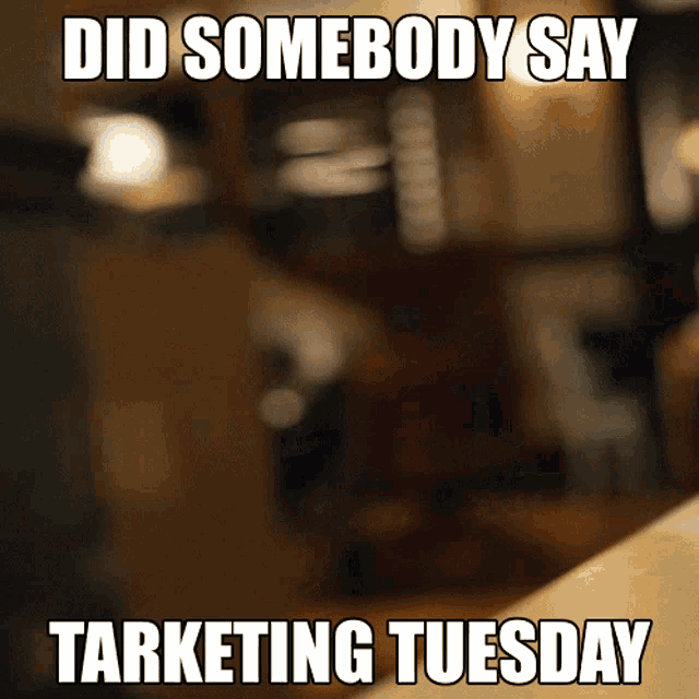 a blurred image with the words did somebody say marketing tuesday