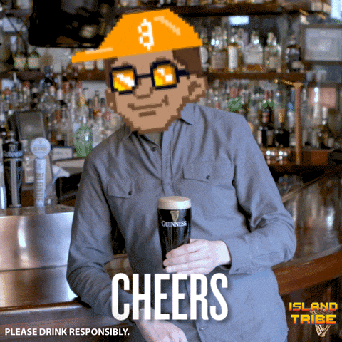 a man holding a glass of guinness beer in front of a bar that says cheers