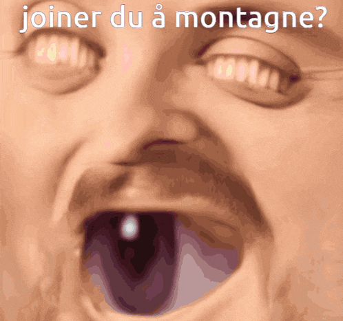 a close up of a man 's face with the words joiner du a montagne written above it