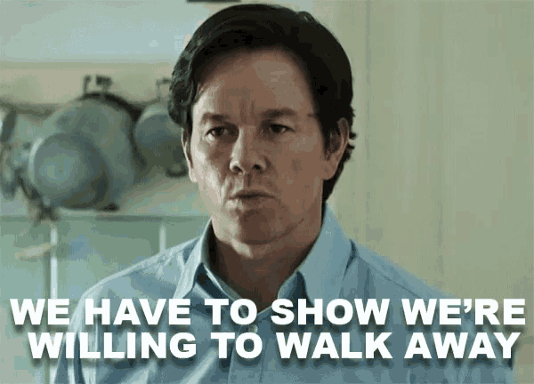 a man in a blue shirt says we have to show we are willing to walk away