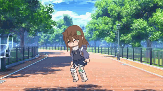 a girl with a bandage on her leg is walking down a brick sidewalk