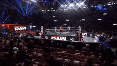 a wrestling ring with a sign that says raw