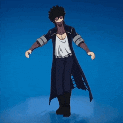 a man in a black coat is dancing on a blue background .