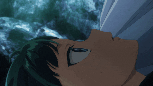 a close up of a person 's face with a blue sky in the background