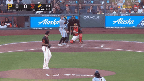 a baseball game between the dodgers and giants is being played