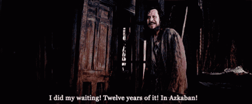 a man is standing in a dark room and says i did my waiting twelve years of it ! in azkaban !