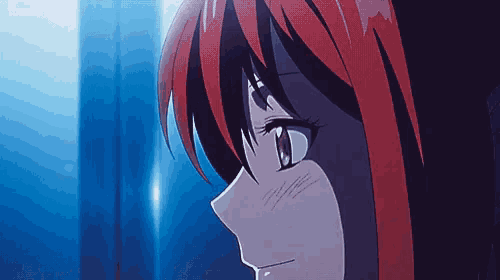 a close up of a girl 's face with a blue background and a watermark that says tokyopops