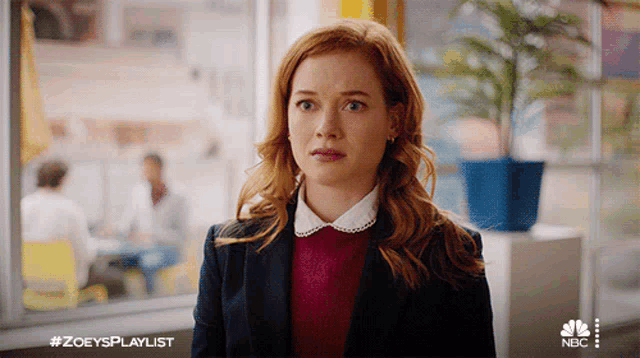 a woman is standing in front of a window with the hashtag #zoeysplaylist on the bottom right