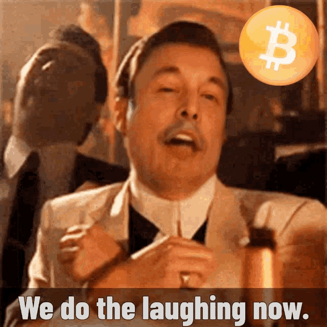 a man in a suit and tie is laughing with the words we do the laughing now below him