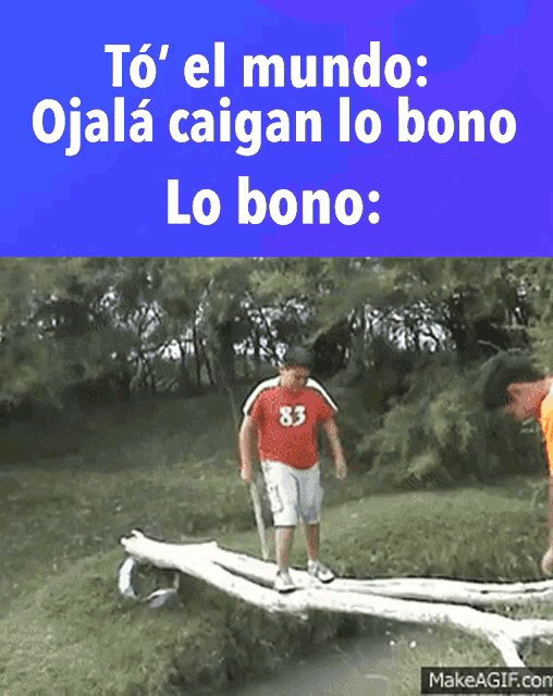 a man in a red shirt with the number 83 on it stands on a log
