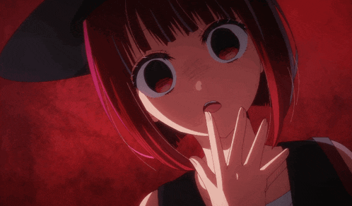 a girl with red hair and a black hat is smiling
