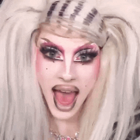 a close up of a person 's face with makeup on .