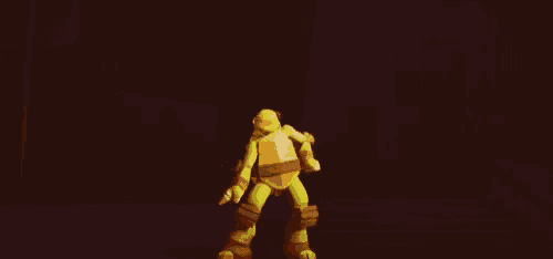 a ninja turtle is dancing in a dark room .