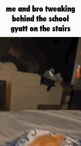 a gif of a person tweaking behind the school gyatt on the stairs