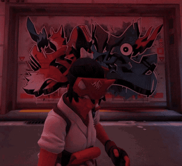 a cartoon character with a mask on stands in front of a wall that has graffiti on it