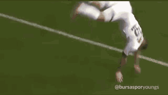 a blurred image of a soccer player on the field .
