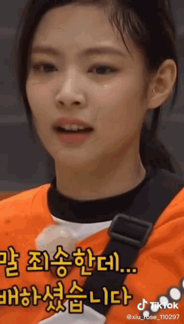 a girl with korean writing on her face