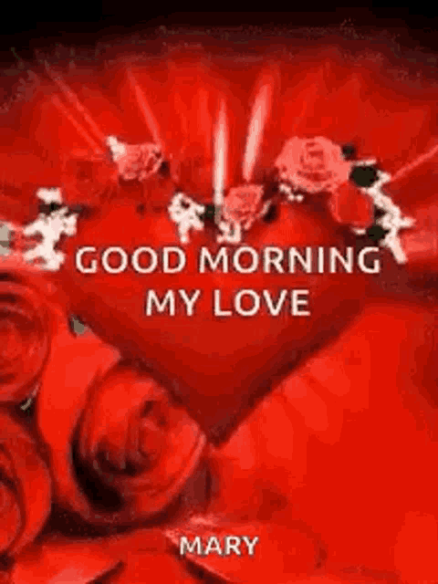 a red heart surrounded by red roses with the words `` good morning my love '' .