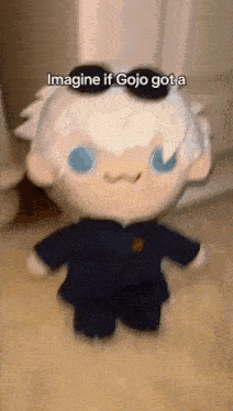 a stuffed animal with sunglasses on it is standing on the floor .