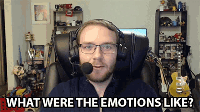 a man wearing headphones and a microphone asks what were the emotions like