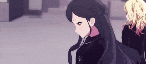 two anime girls are standing next to each other