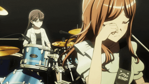 a girl with a guitar strap that says esp
