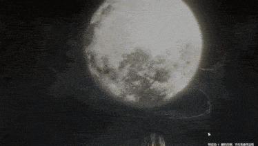 a full moon in a dark sky with chinese writing