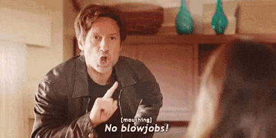 a man in a leather jacket is pointing at a woman and saying `` no blowjob '' .