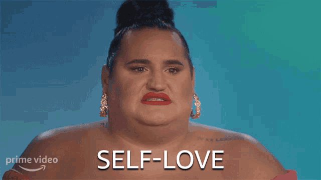 a woman with a tattoo on her arm says self love