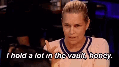 a woman is holding a lot in the vault , honey .