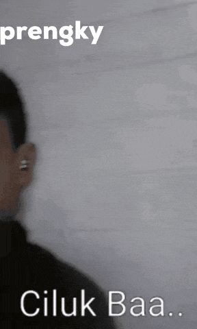 a close up of a man 's face with the words ' prengky ciluk baa ' below him