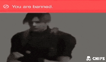 a black and white image of a man with a red sign that says you are banned