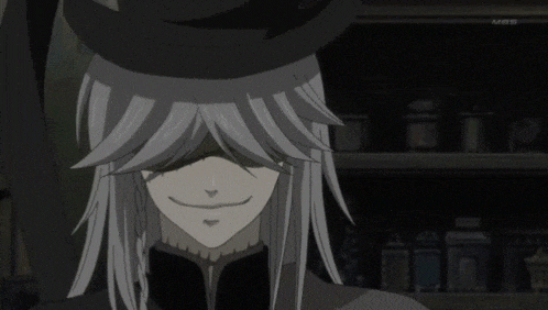 a man with long white hair and a top hat is smiling