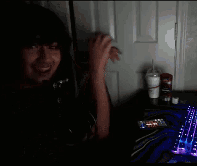 a person in a dark room with the words " its rewind time " on the bottom