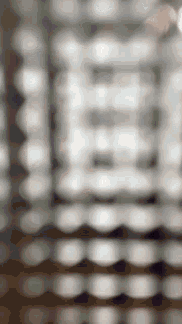 a blurred image of a building with a lot of lights on it