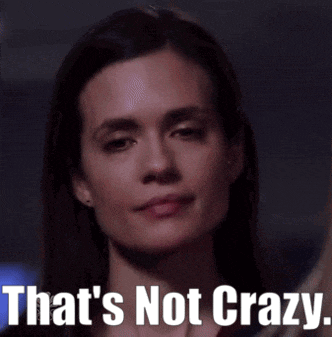 a close up of a woman with the words that 's not crazy behind her