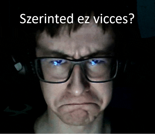 a man wearing glasses and headphones is making a funny face with the words szterinted ez vices written above him