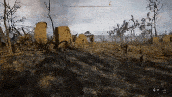 a video game is being played in a field with a tower in the distance .