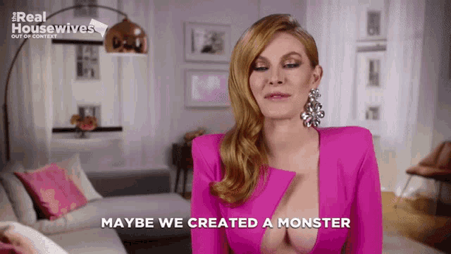 a woman in a pink dress with the words maybe we created a monster