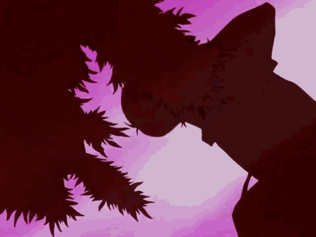 a silhouette of a person against a red background