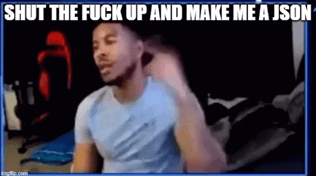 a man is sitting in front of a computer screen with the words `` shut the fuck up and make me a json ''