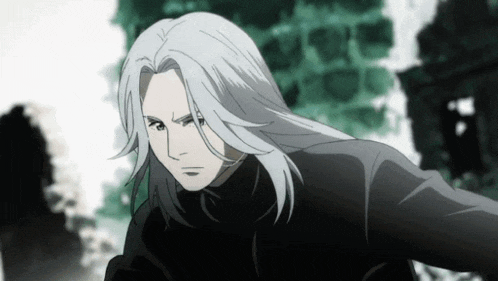a man with long white hair is wearing a black top
