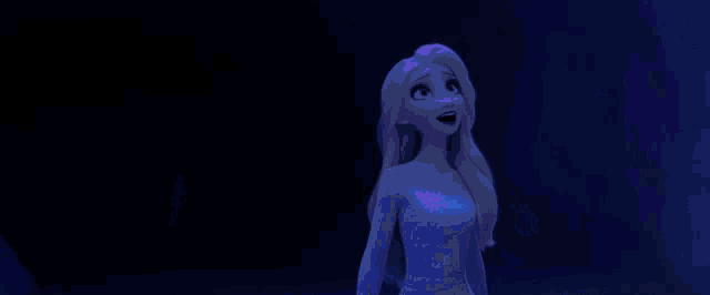 a woman is standing in front of a cave with purple lights