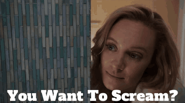 a woman behind a glass door with the words you want to scream
