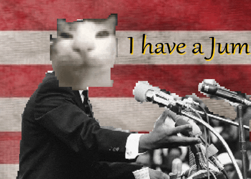 a man speaking into a microphone with the words i have a jum in the background