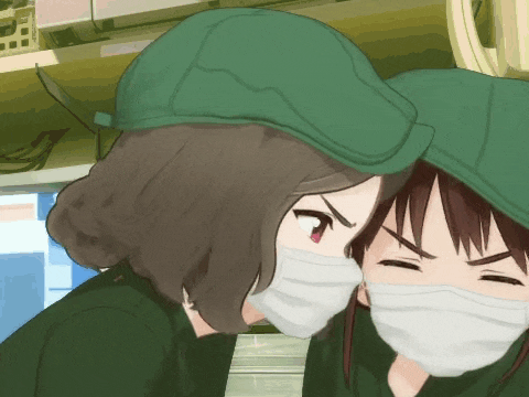 a girl wearing a green hat and a white mask