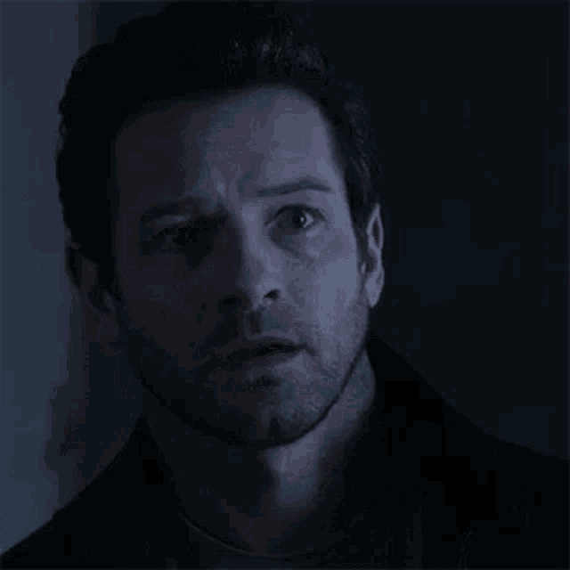 a close up of a man 's face with the words is that all behind him